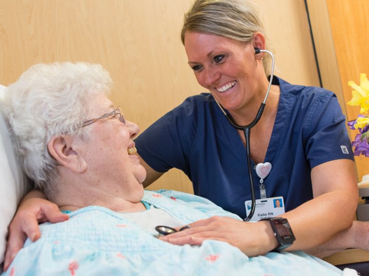 Patient being examined for discharge