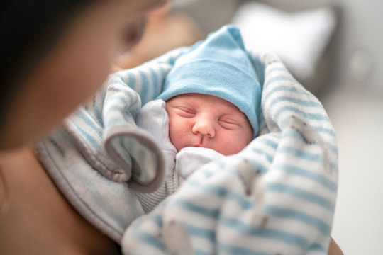 Woman holding a baby