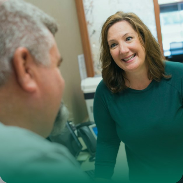 Patient speaking with a care giver